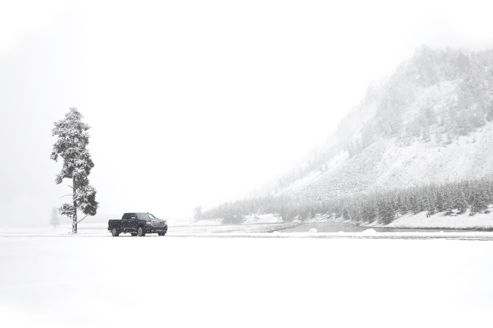 GMC Sierra Denali Truck outdoor commercial lifestyle Photography in the snowy Grand Tetons by Andrew Studer