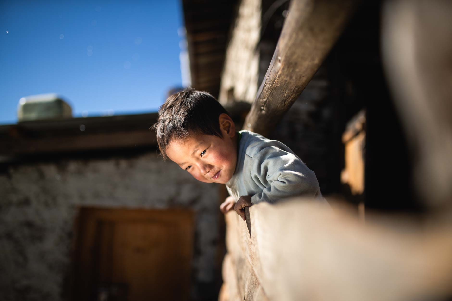 Portrait photography of a young Bhutanese villager in Merak, Bhutan