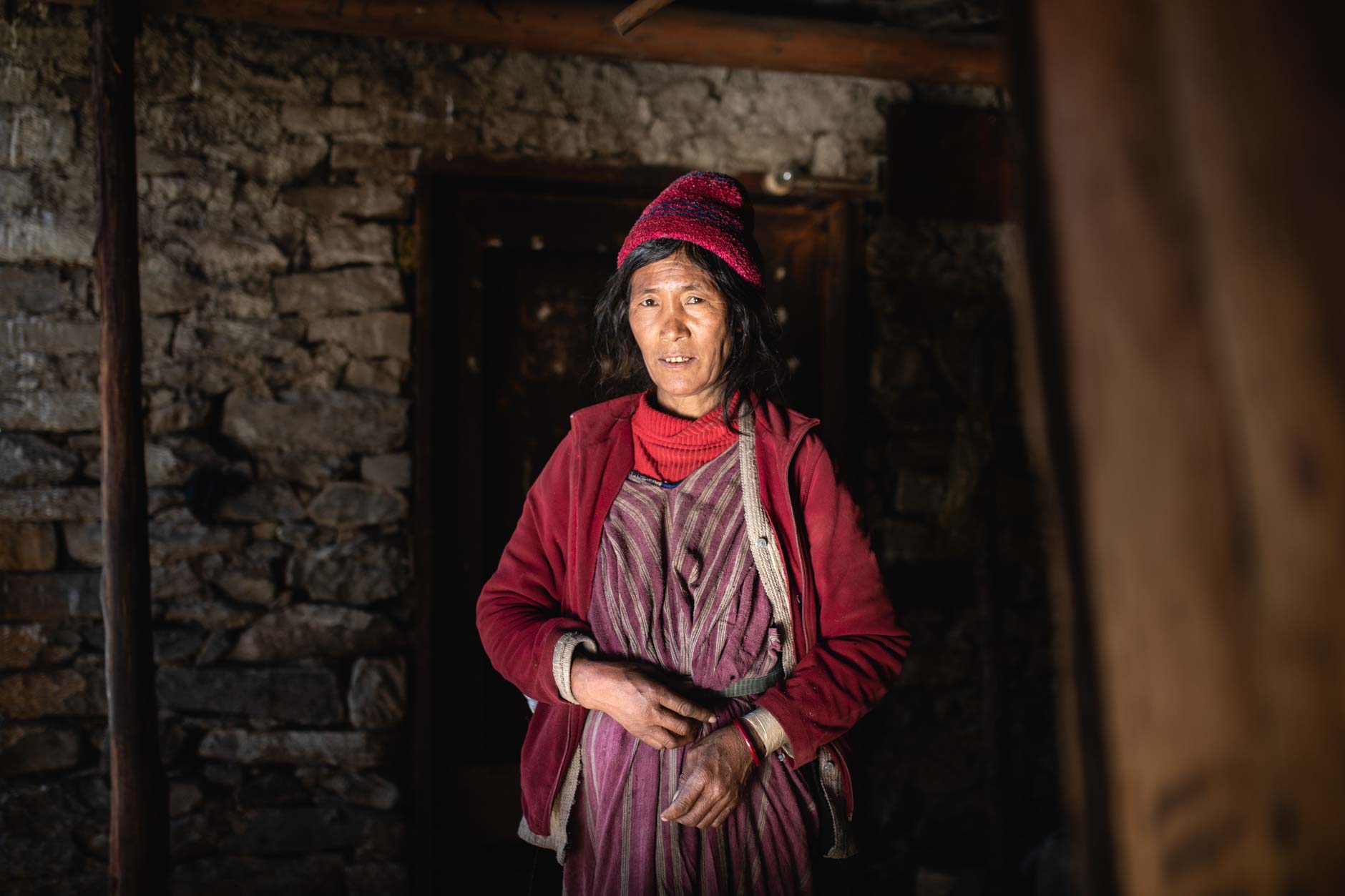 Portrait photography of a tribeswoman in the village of Merak, Bhutan