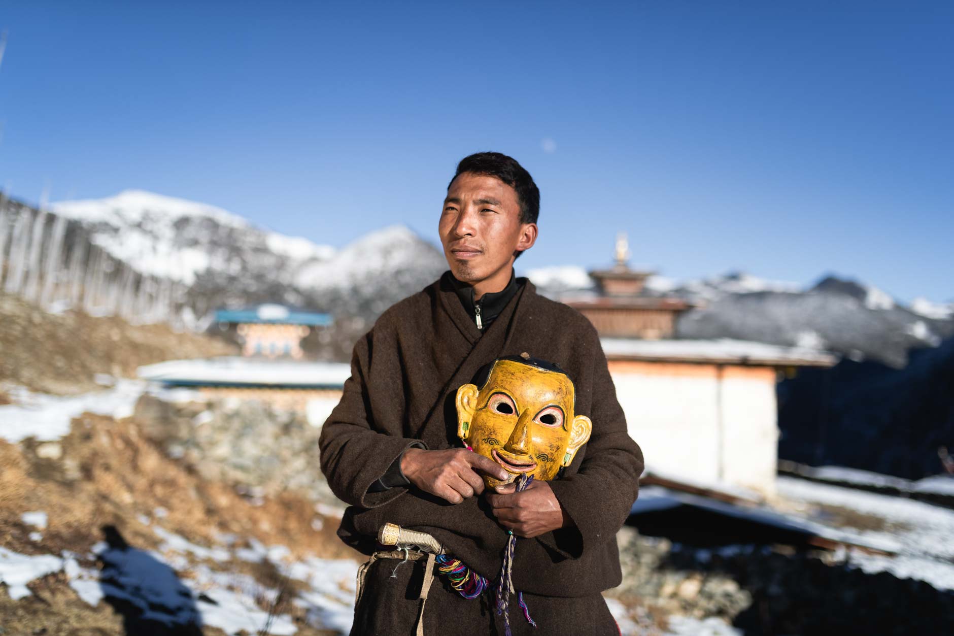 Portrait photography of a Brokpa Tribesman yak dancer in Merak, Bhutan