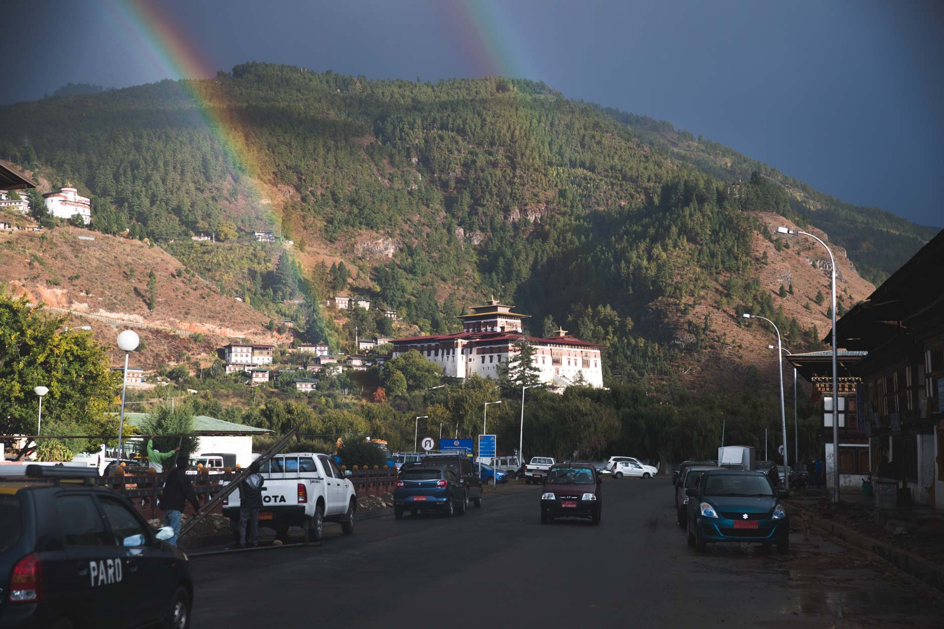 Photography of double rainbows over the temple of Ring Dzong in Paro, Bhutan