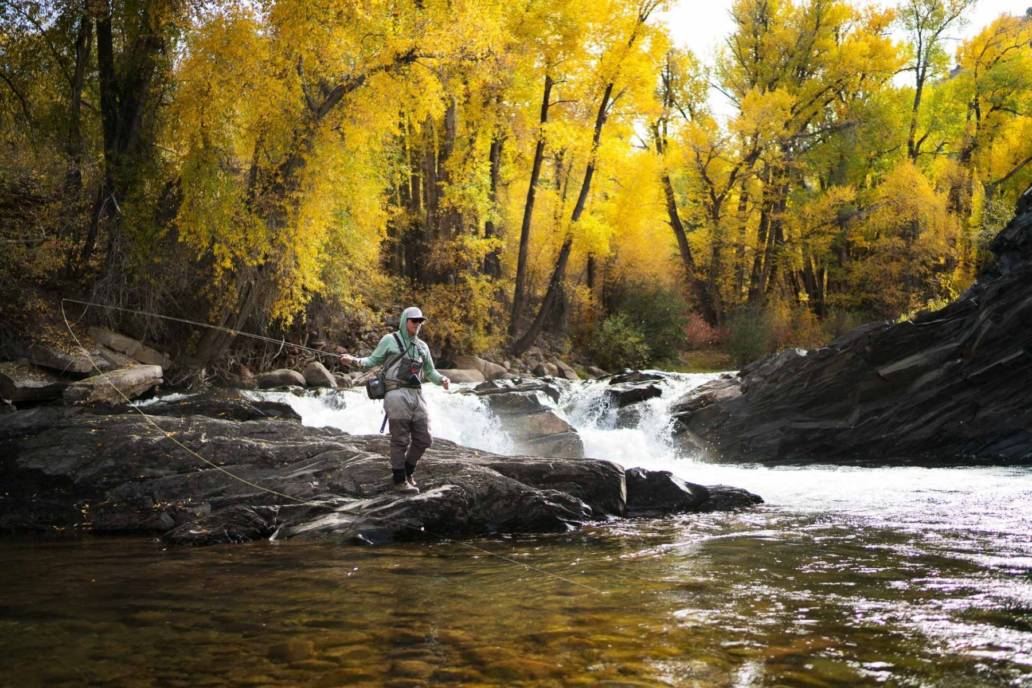 Commercial lifestyle photography of a fly fisherman in Aspen, Colorado
