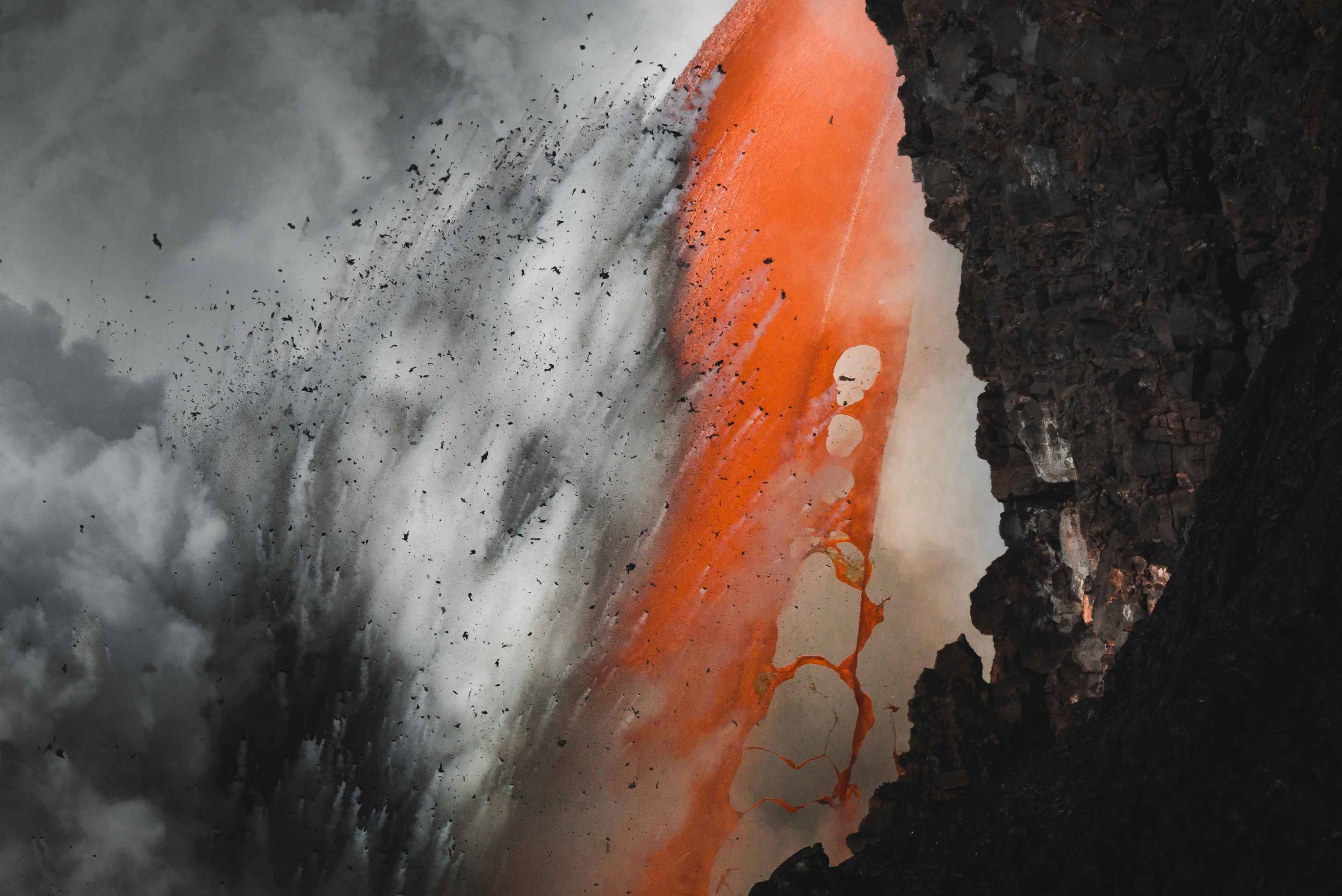 Closeup photography of an explosion at a lava firehose in hawaii volcanoes national park