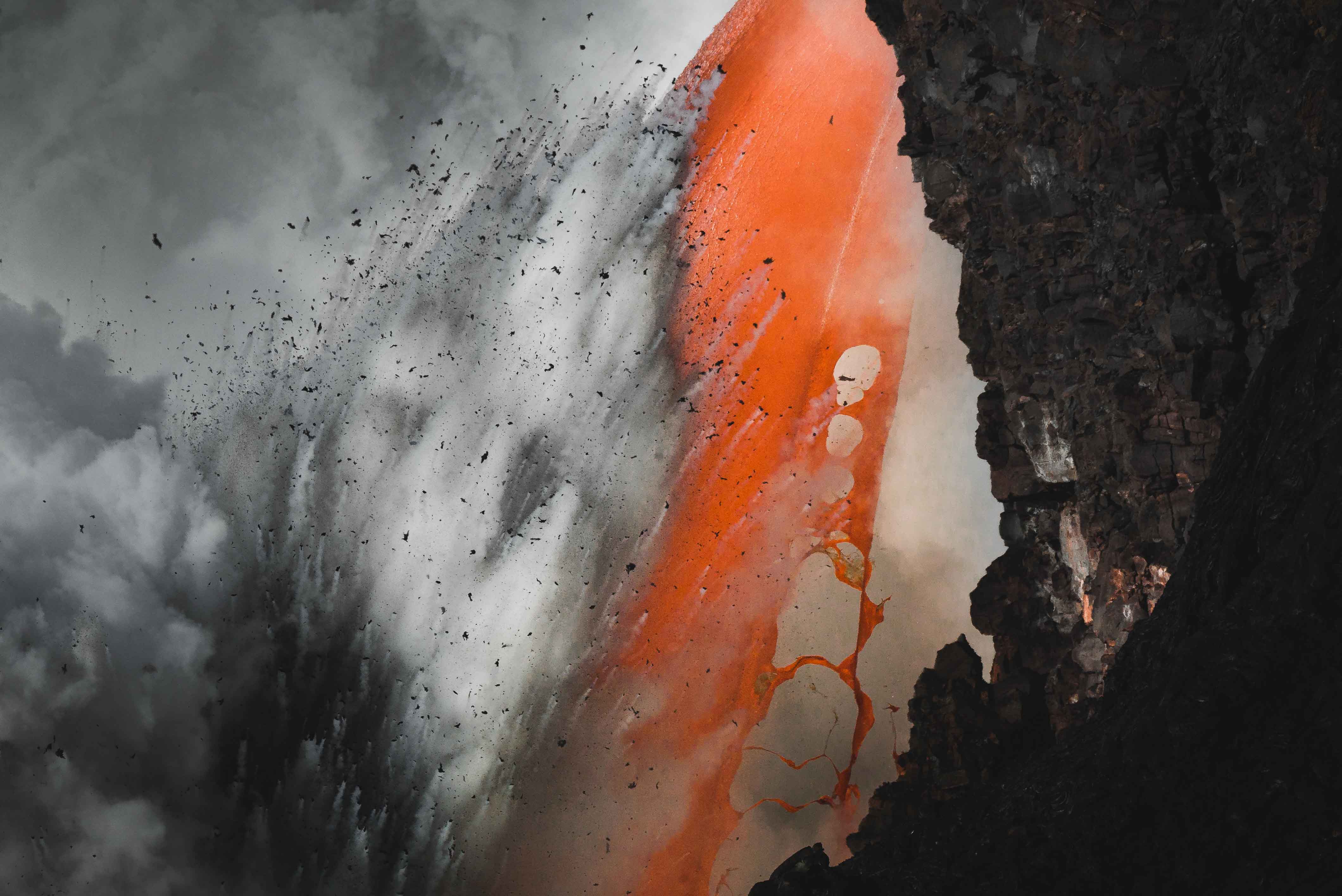 Photography of a lava spout (fire-hose) at Hawaii Volcanoes National Park