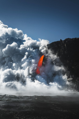 Lava falls into the ocean from a fire hose in hawaii volcanoes national park. With captain Shane Turpin