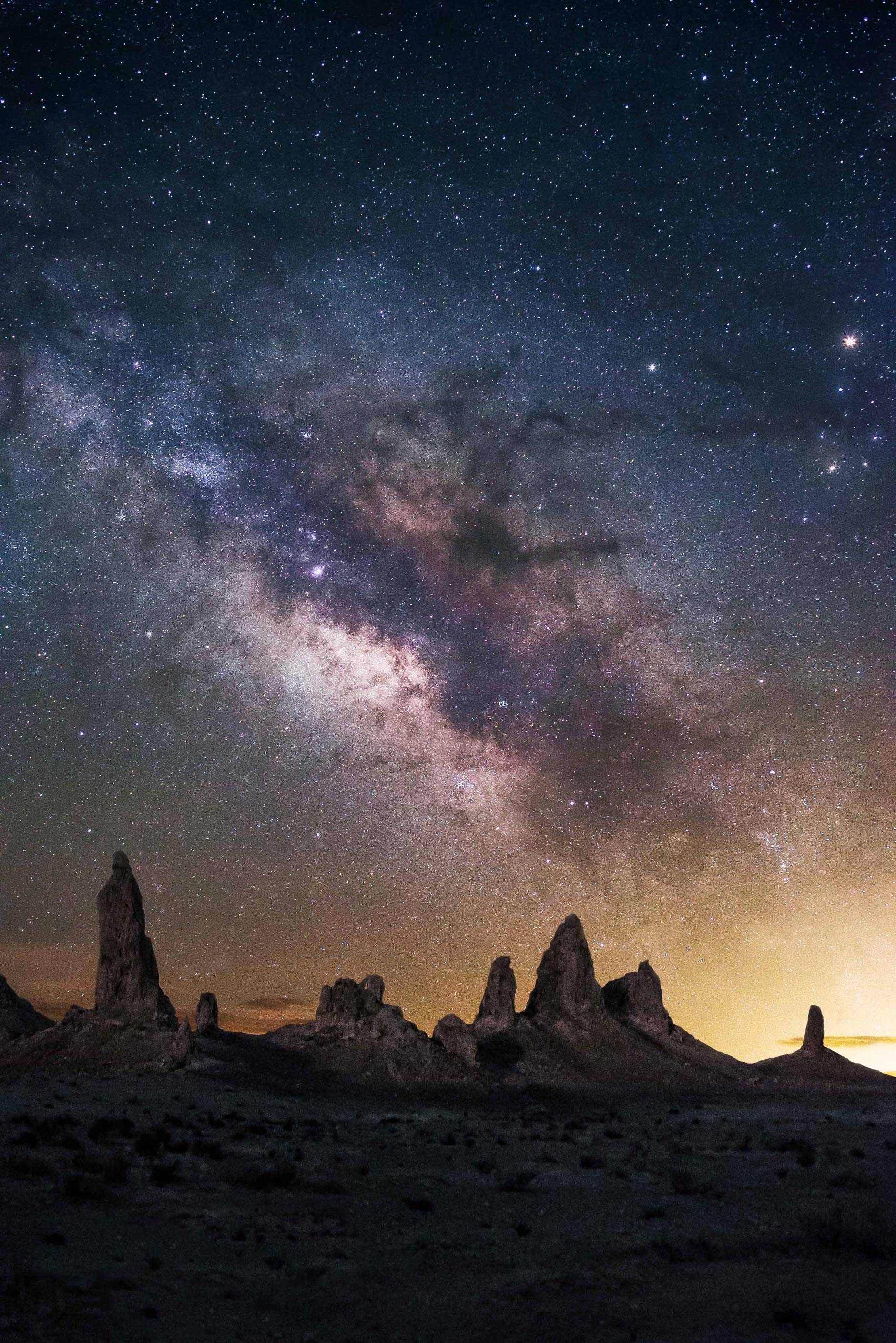 Night photography of the milkyway galaxy and stars in the trona pinnacles, California