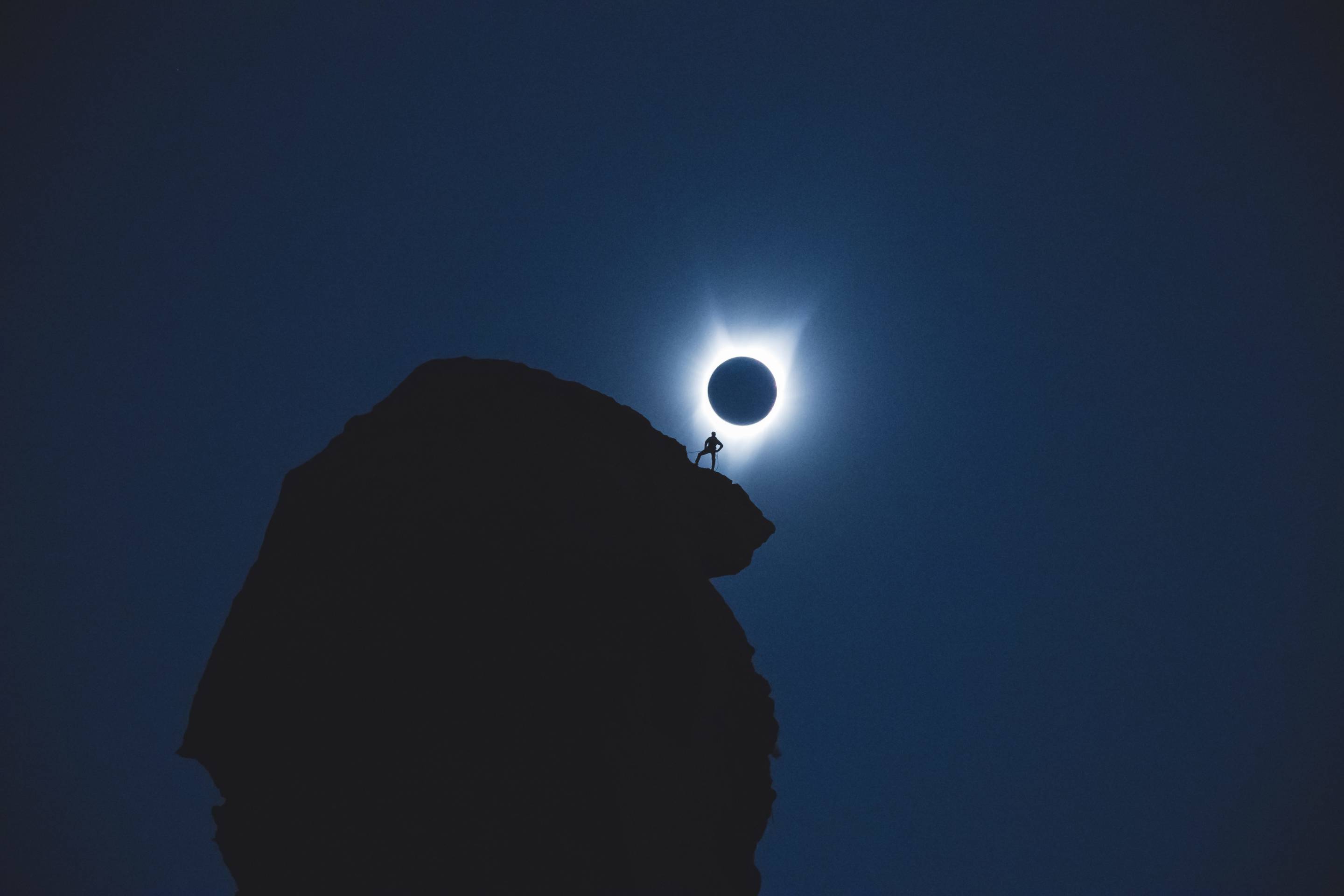 Viral photo of a climber in totality during the total solar eclipse of 2017. Photo taken at Smith Rock state park by Andrew Studer