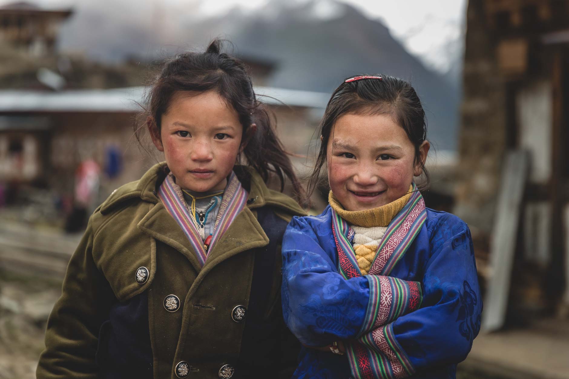 Portrait photography of two young girls in the village of Laya, Bhutan