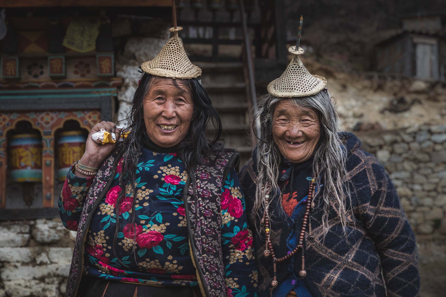 Portrait photography of two elderly Bhutanese women in the village of Laya, Bhutan