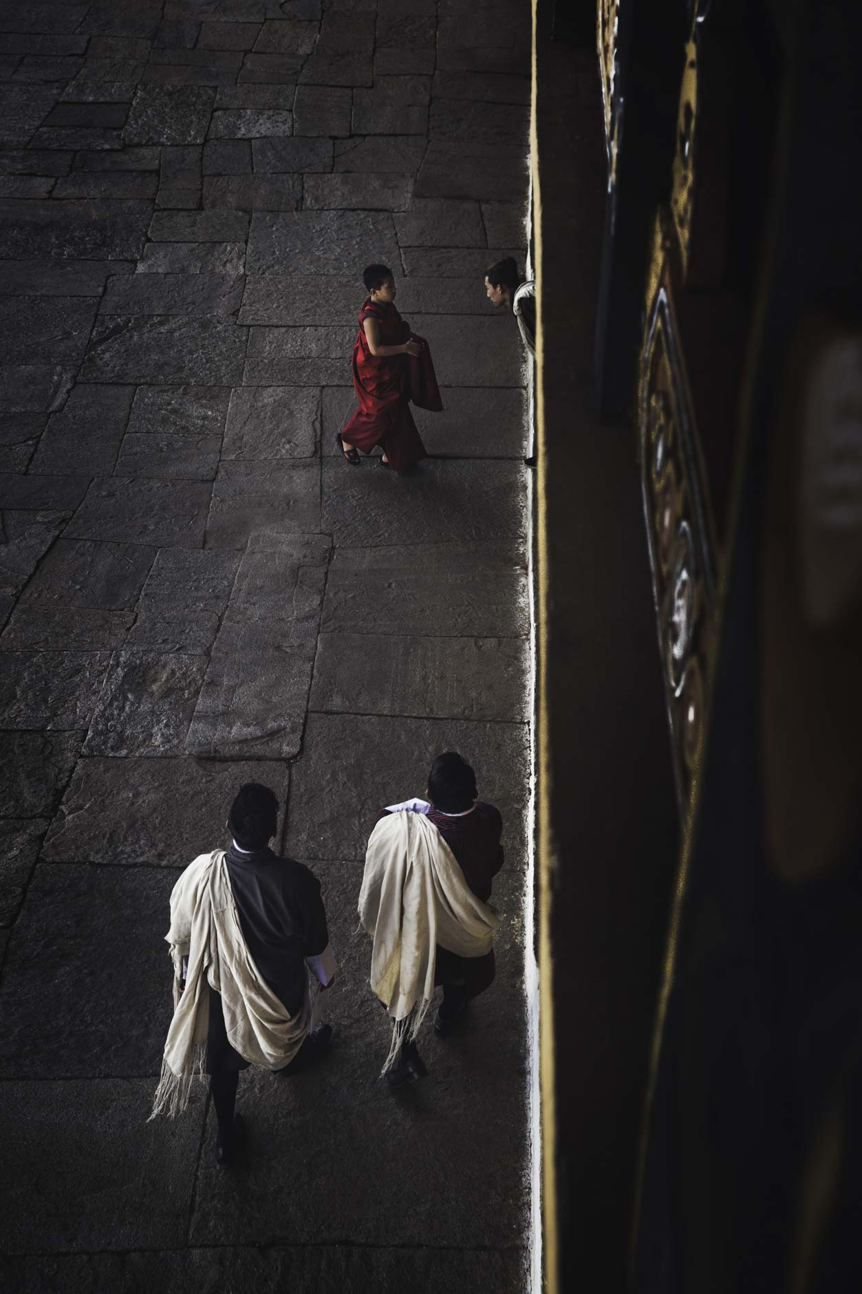 Photography of Monks in Paro Dzong temple in Paro, Bhutan
