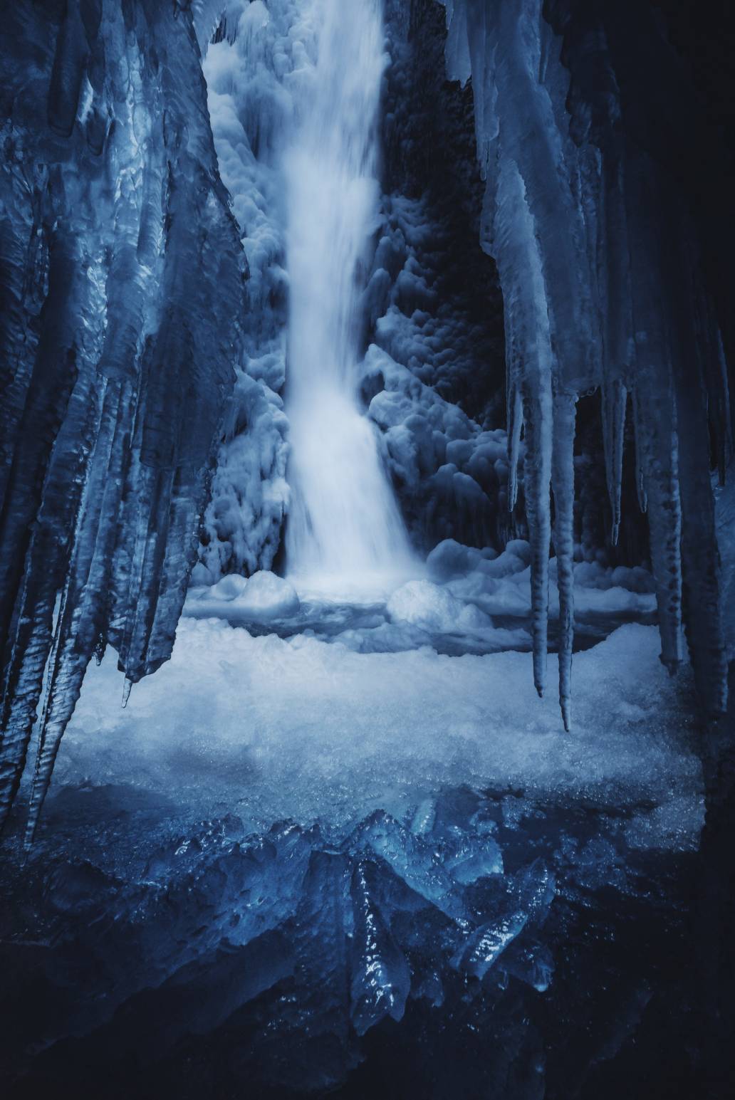 Landscape photography of frozen Oneonta Falls with ice in the Columbia River Gorge, Oregon during winter