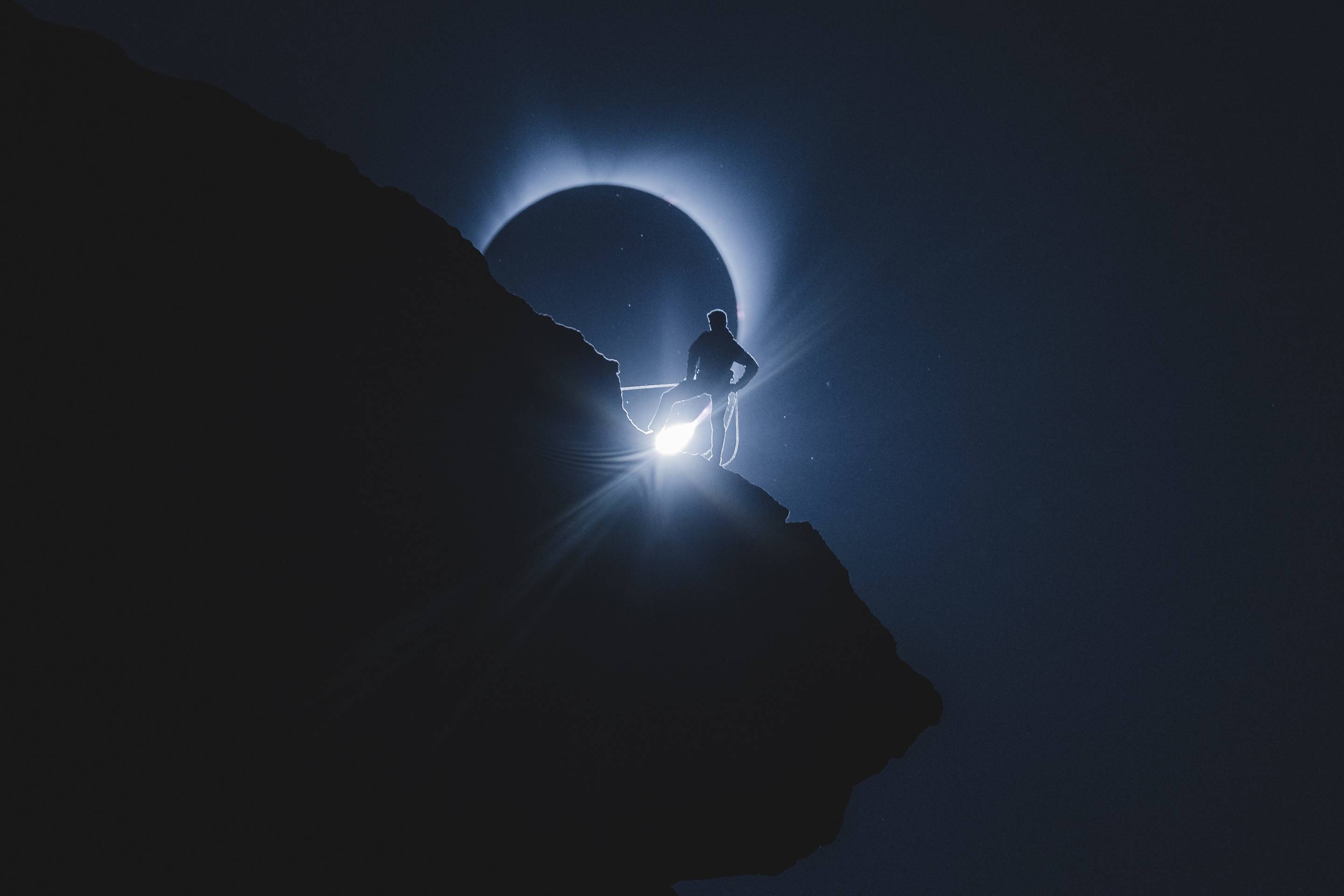 Viral photo of a climber in totality during the total solar eclipse of 2017. Photo taken at Smith Rock state park by Andrew Studer