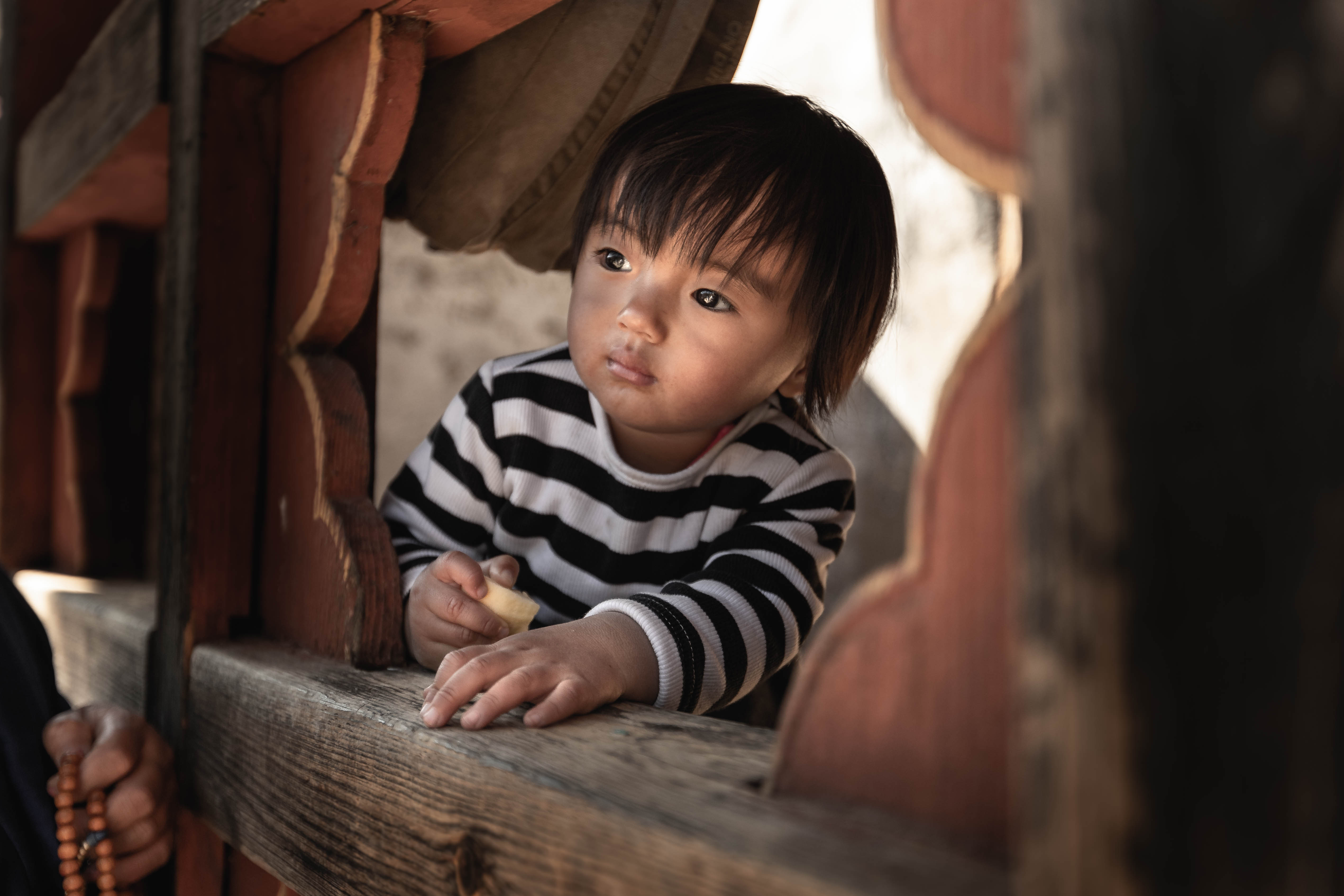 Portrait photography of a little girl in a village near Bumthang, Bhutan