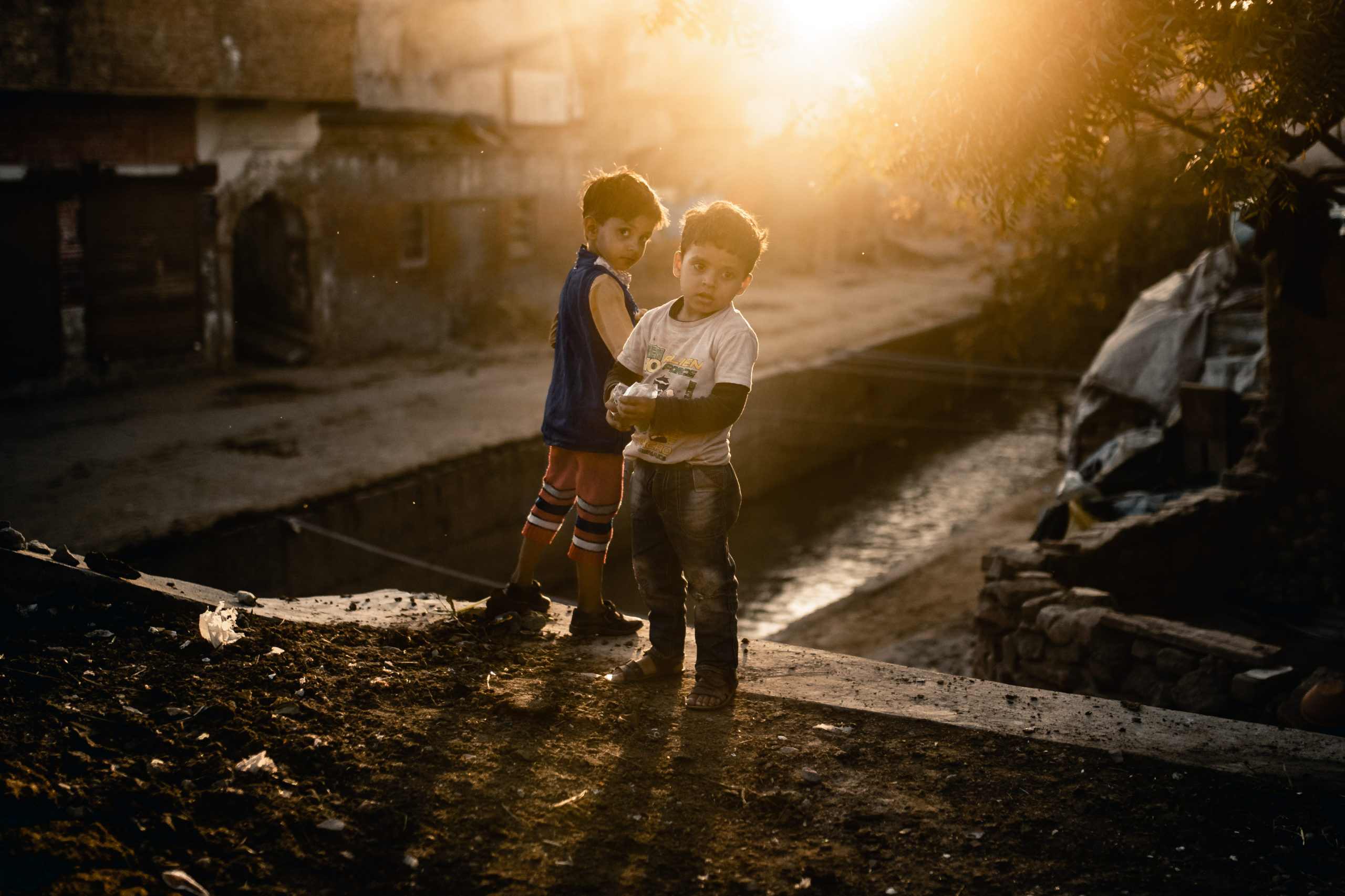 Street Portrait Photography of two young boys India during sunset in Mathura, India