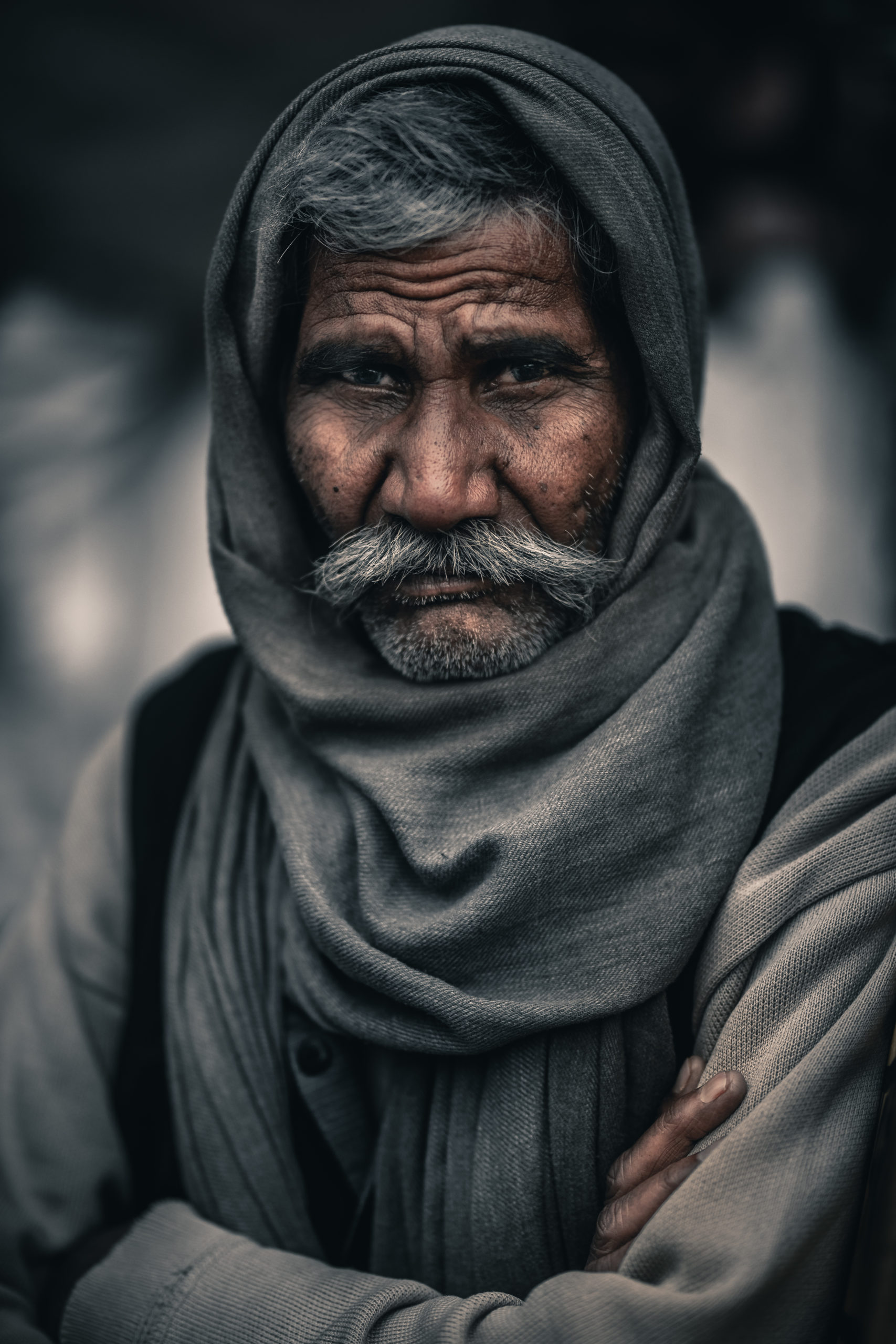 Portrait street photography of an old man in the streets of Mathura, India