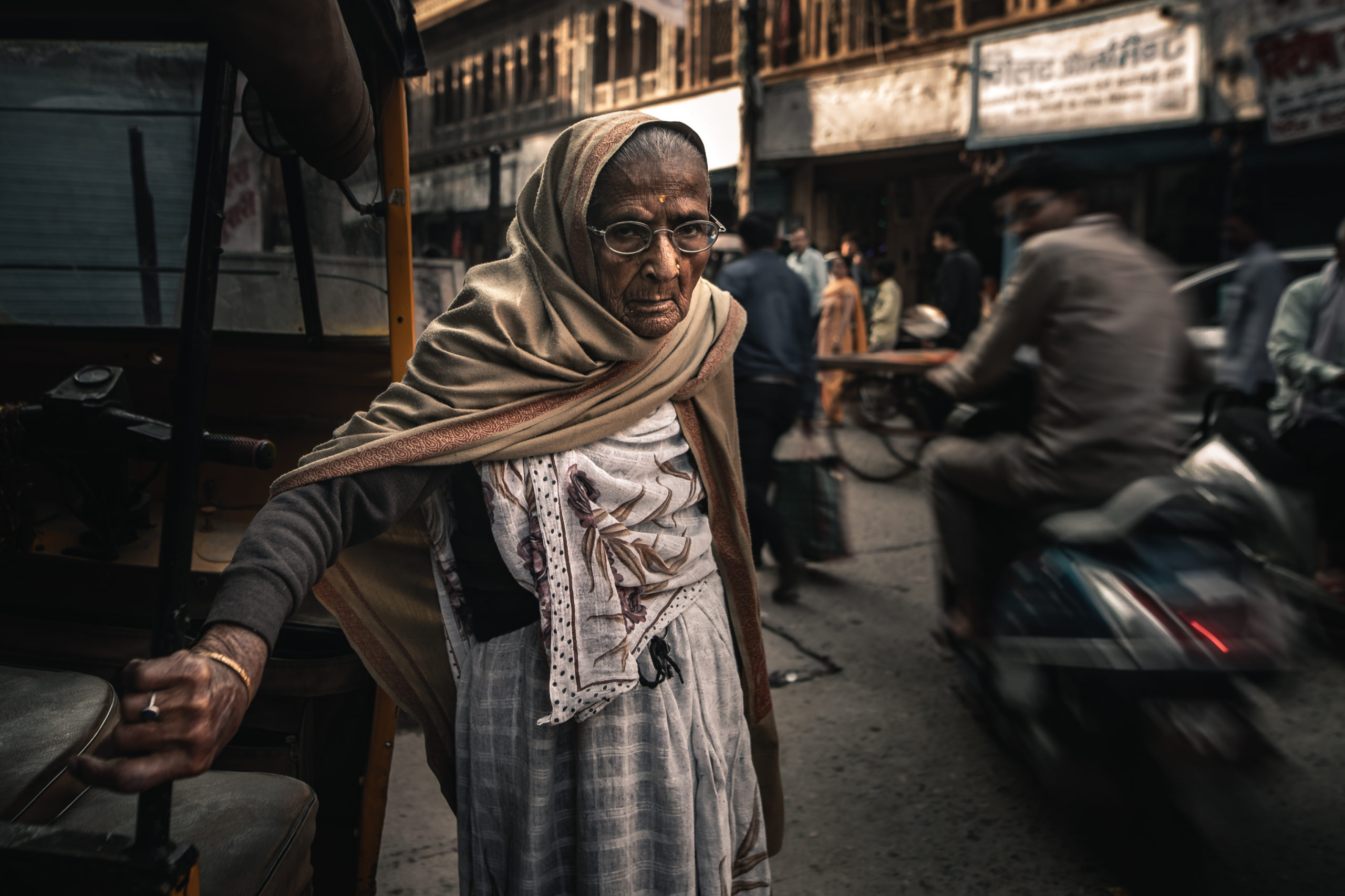 Street portrait photography of an elderly woman on the streets of Mathura, India