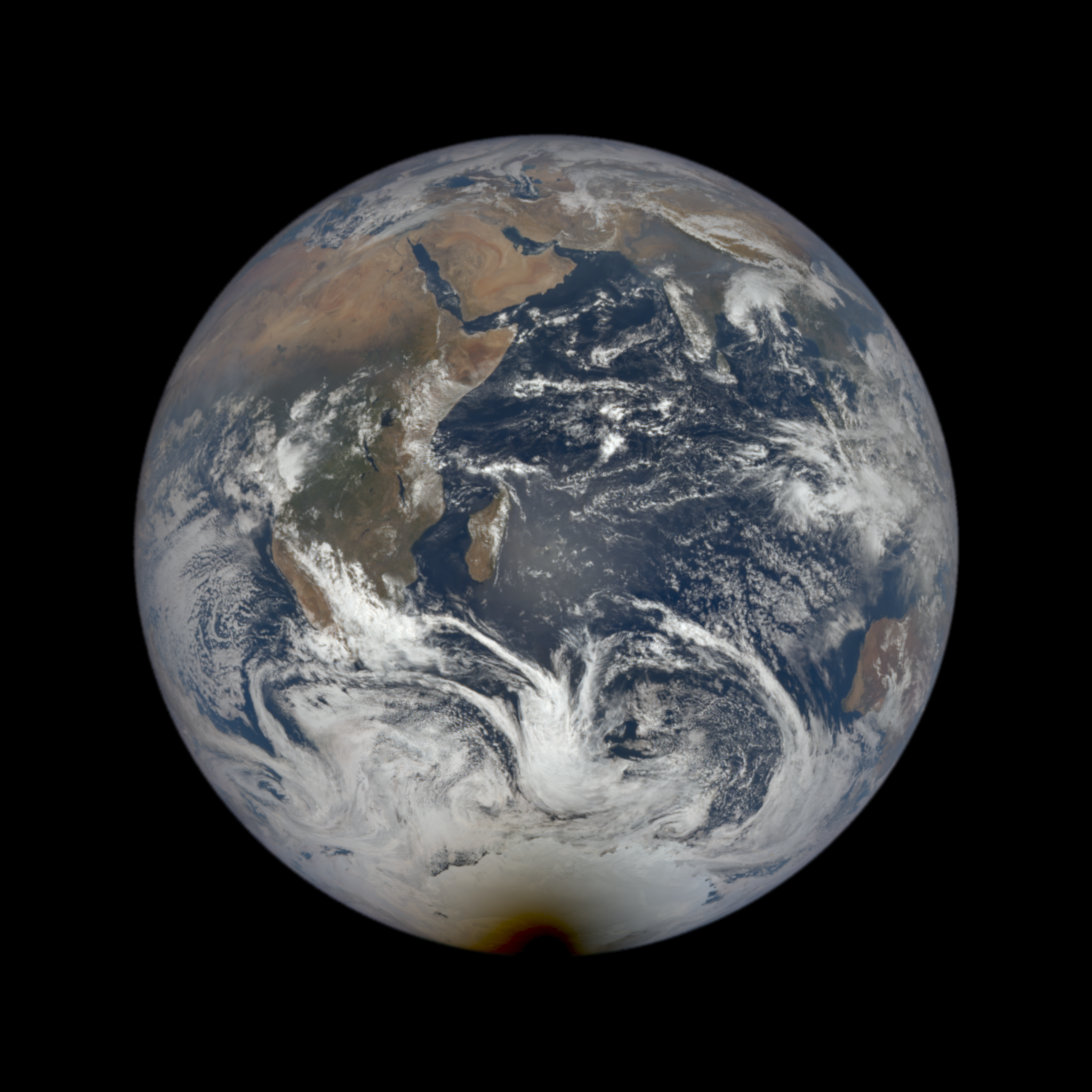 The Moon’s shadow on the Earth taken by the camera on board the Deep Space Climate Observatory (DSCOVR). Image courtesy of NASA
