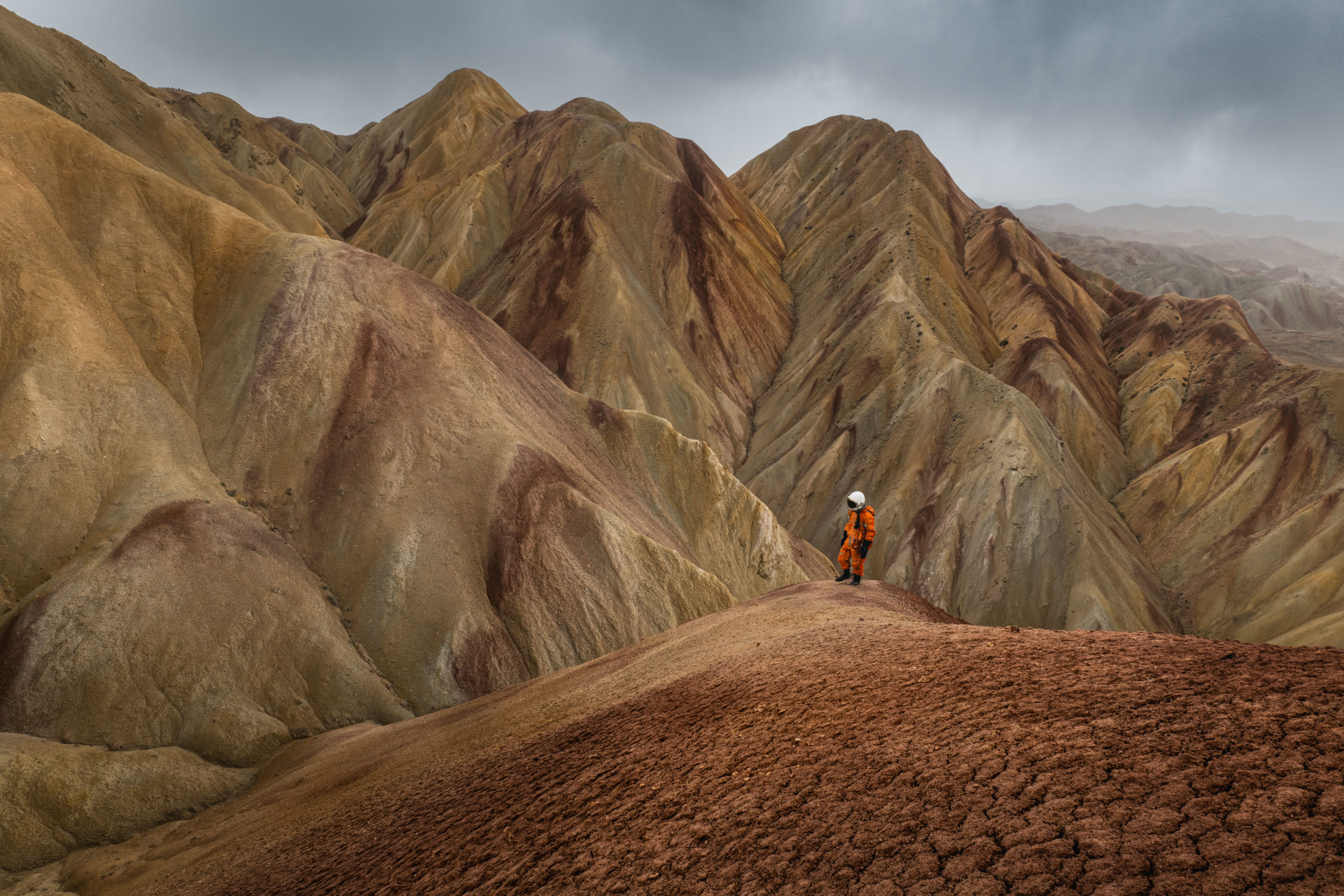 Landscape photography of an astronaut exploring the otherworldly mountains of northern Iran