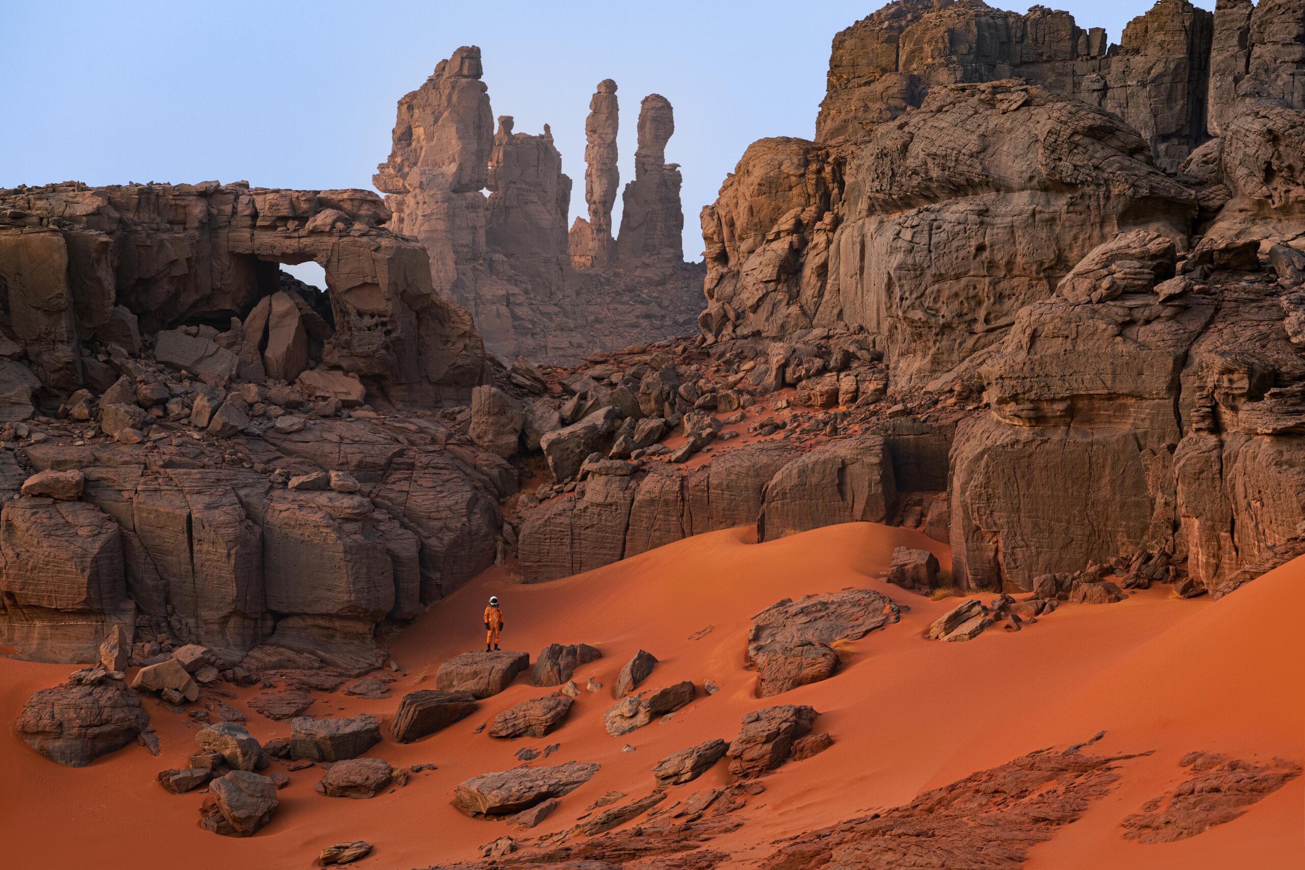 The Mars-like landscape of North Africa's Tassili N' Ajjer National Park. Photograph of an astronaut.