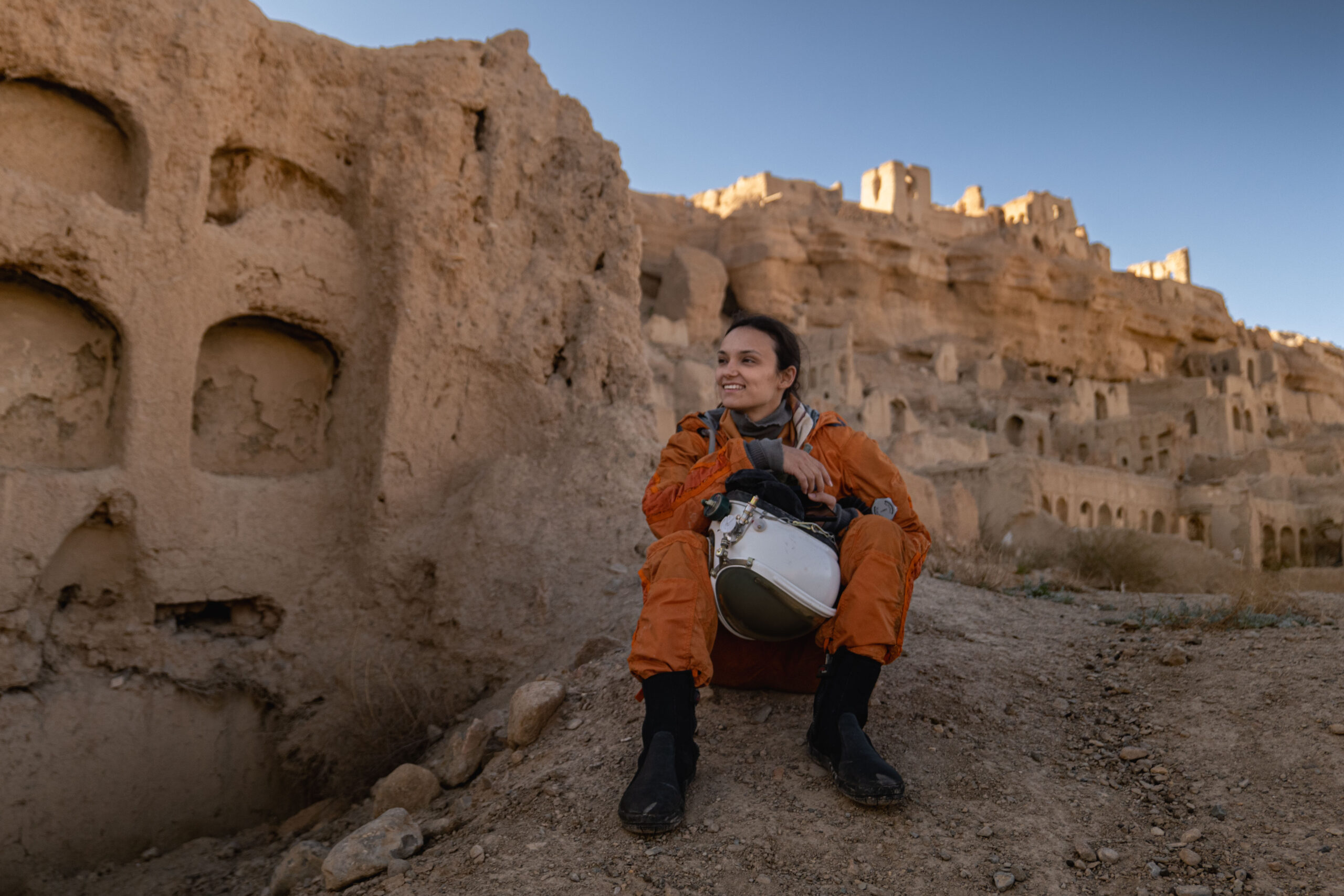 'Astronaut' Bailey O'Bar cools down in the shade during a warm evening at the ruins of a castle in central Iran