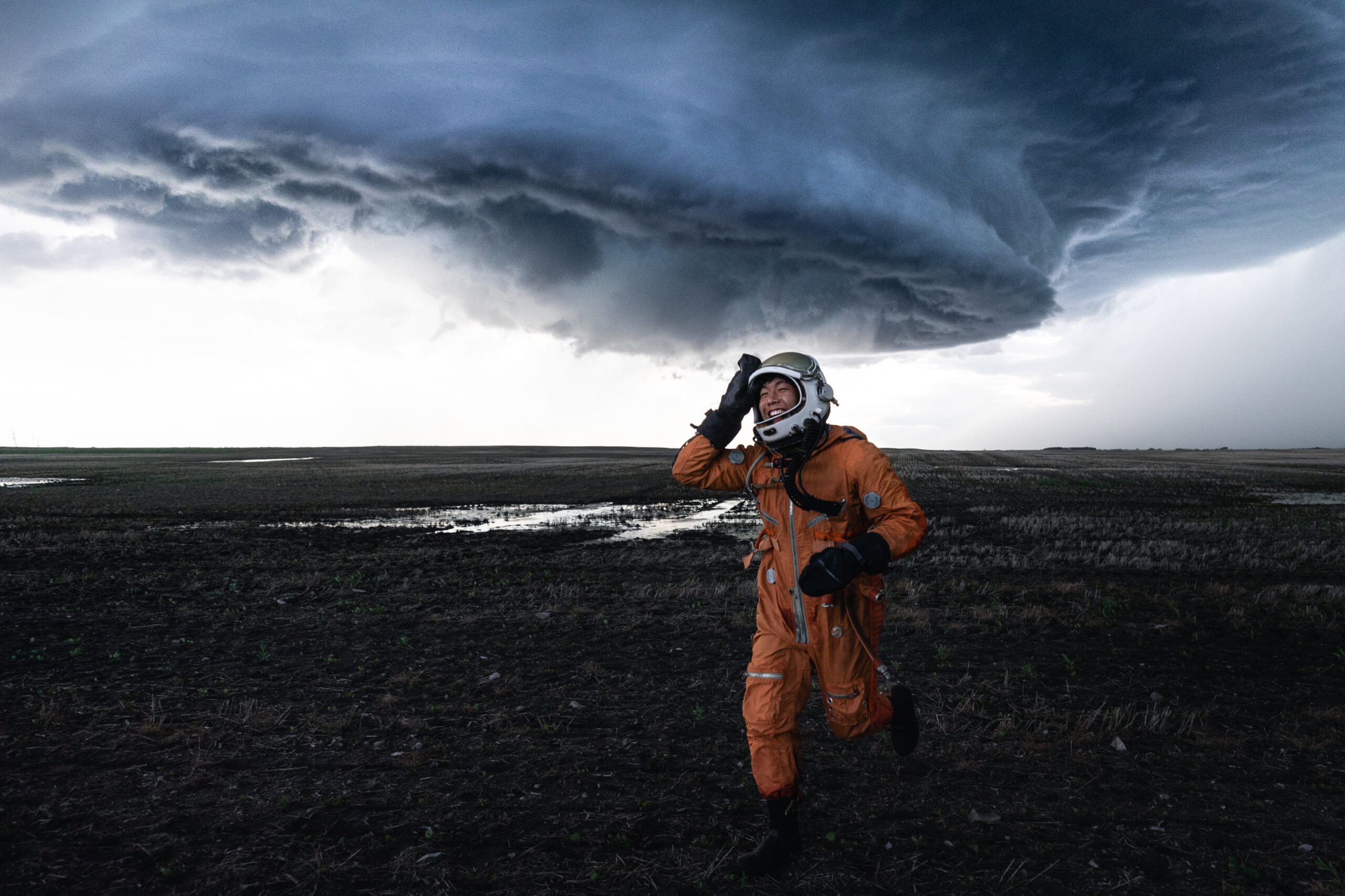 'Astronaut' Johnny Tran sprints back to the team vehicle to reposition and get ahead of the quickly approaching supercell.