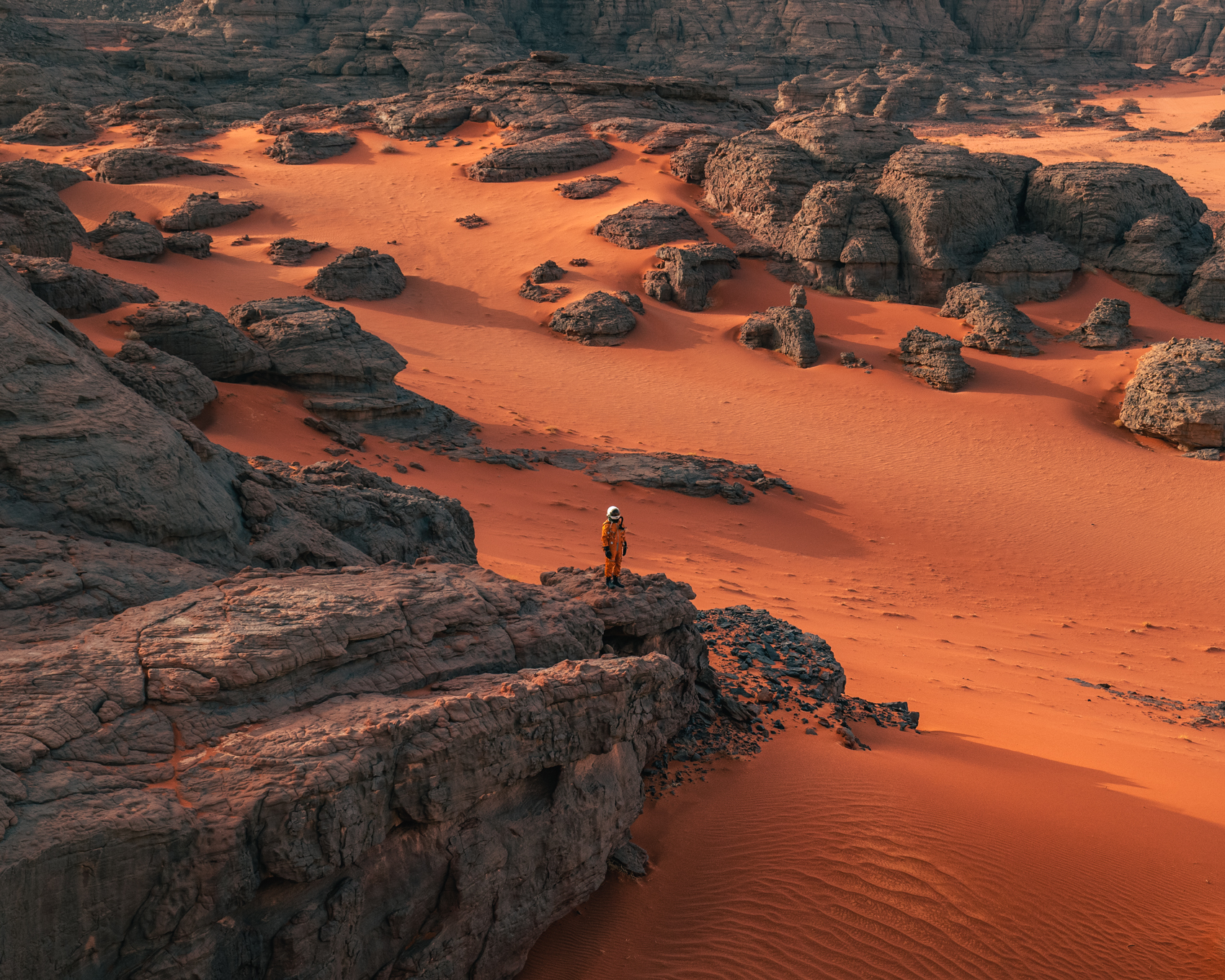 The red landscape of Tadrart Rouge on the Algeria - Libyan border resembles Mars