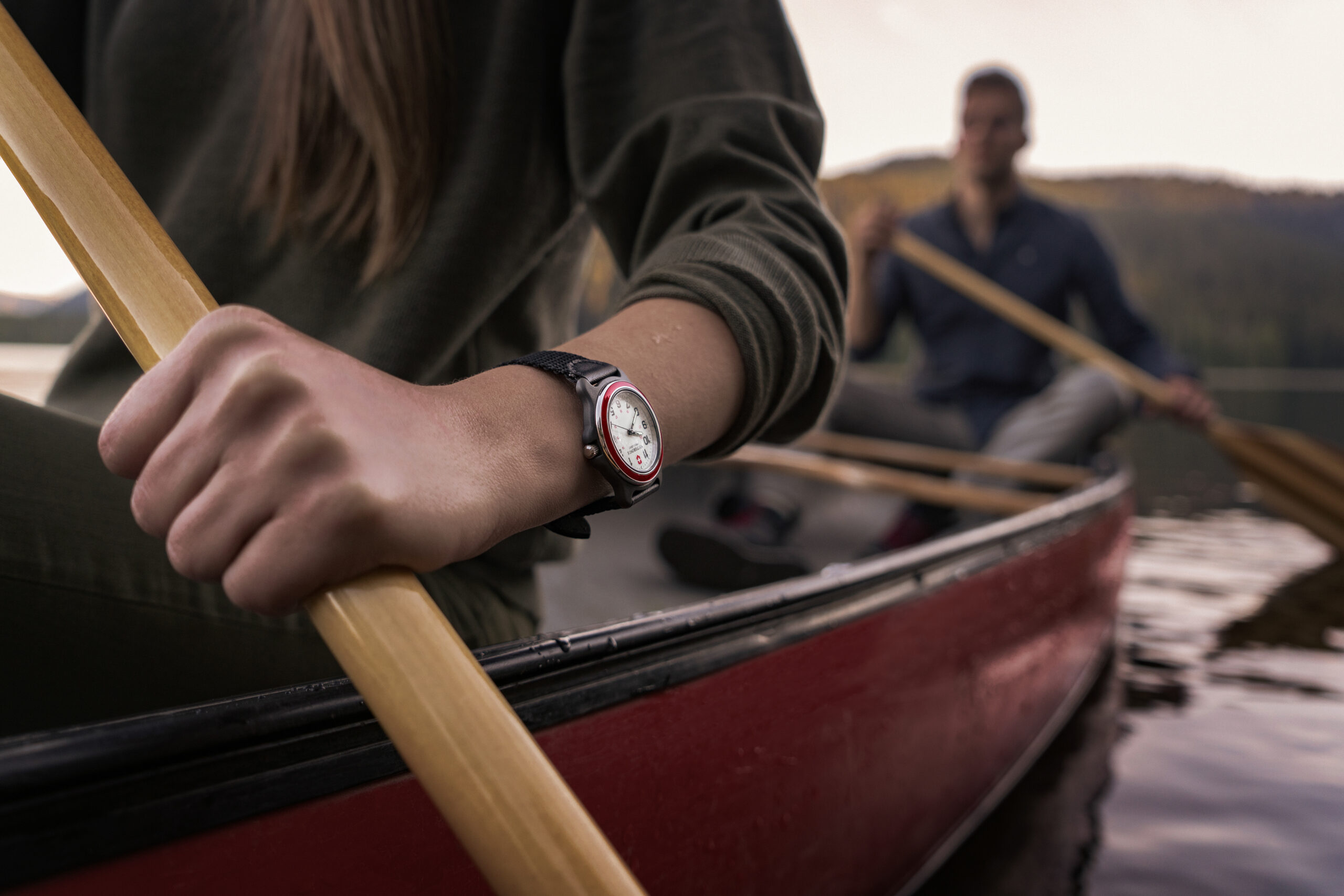 Commercial lifestyle photography shot of a woman on a canoe for Victorinox Swiss Army