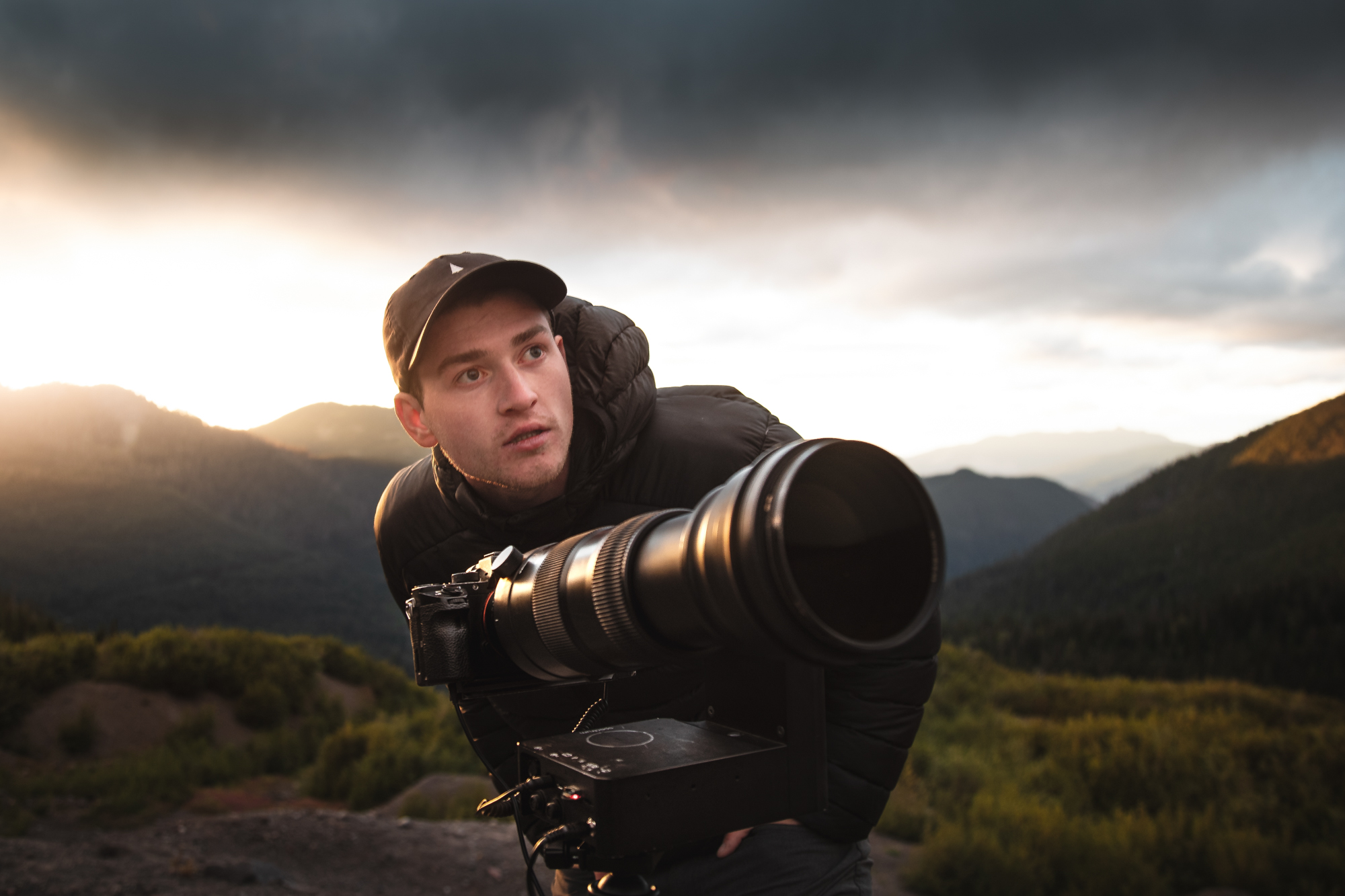 Andrew Studer setting up a telephoto timelapse of Coleman Glacier during sunset