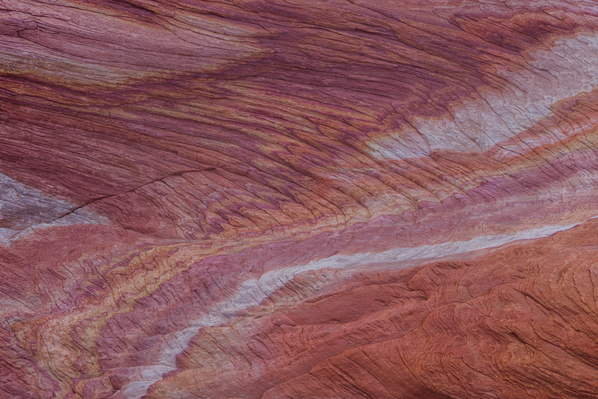 Abstract landscape photography of colorful geological formations and patterns in the desert of the American Southwest