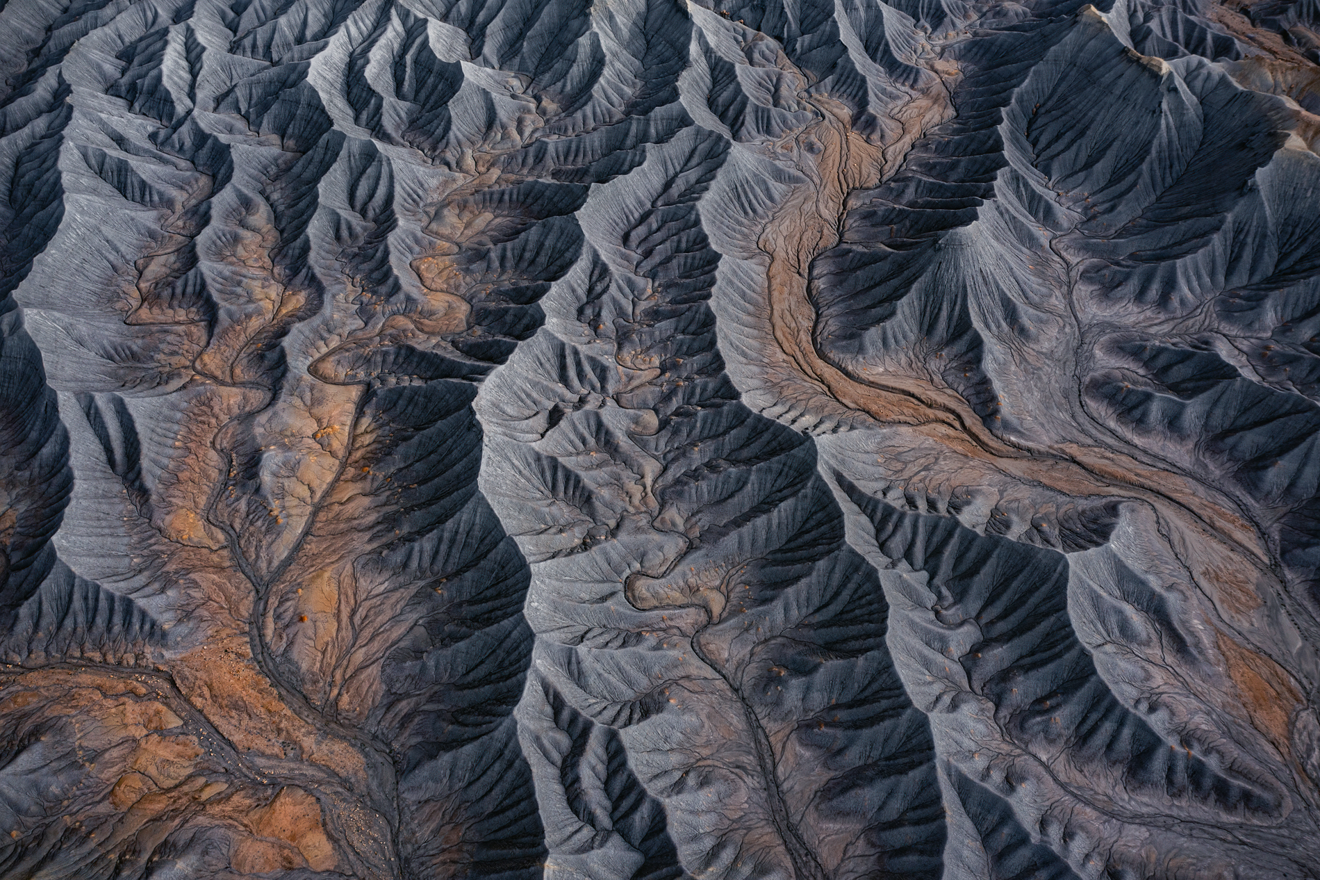 Aerial landscape photography captured above Utah's Badlands.